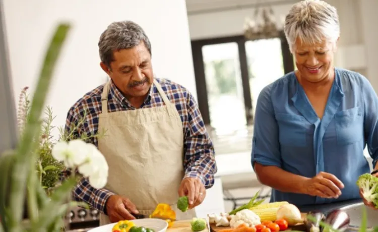 image of two older adults cooking