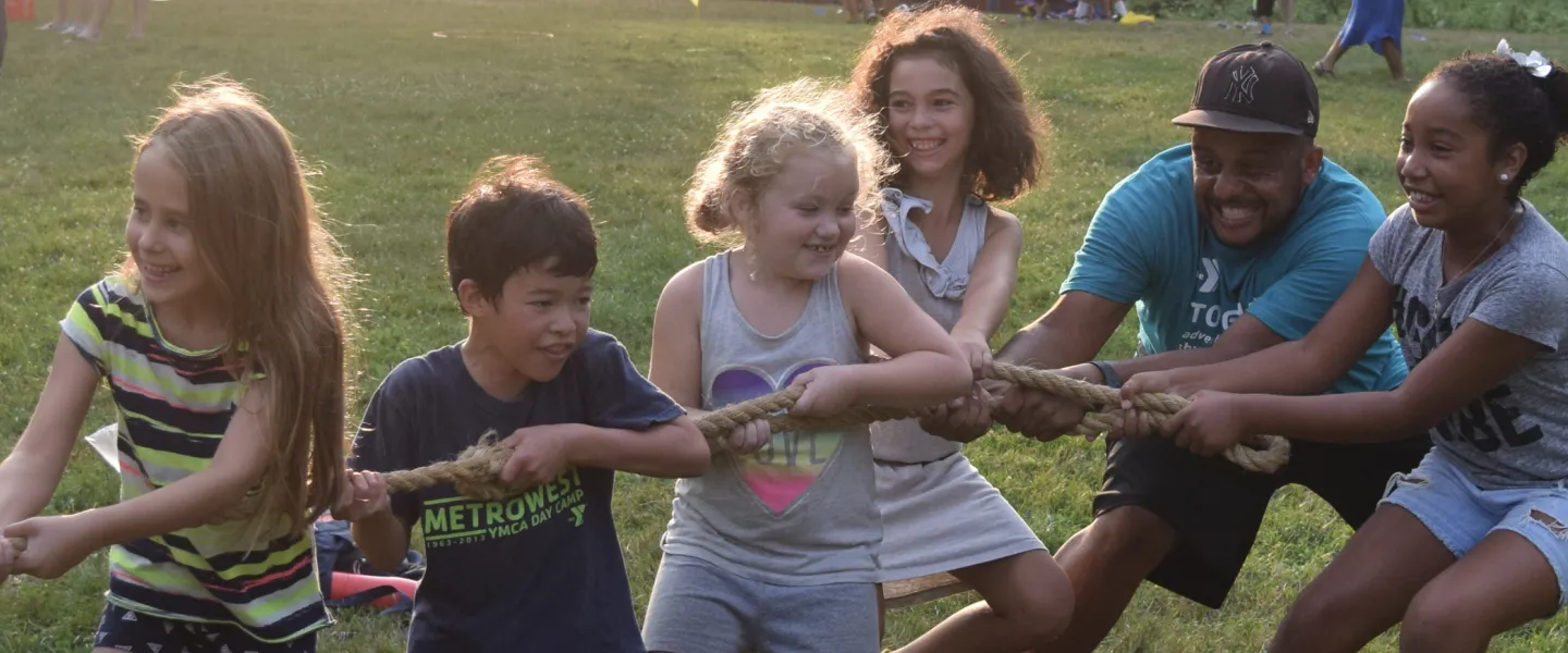 image of campers playing tug-of-war