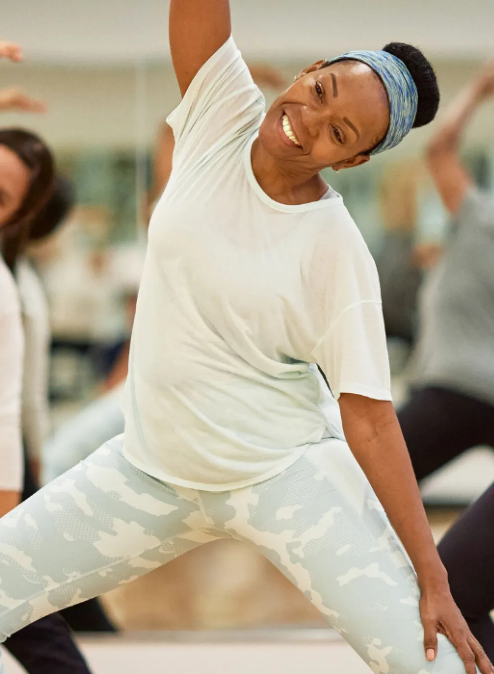 Group exercise class with yoga and dance