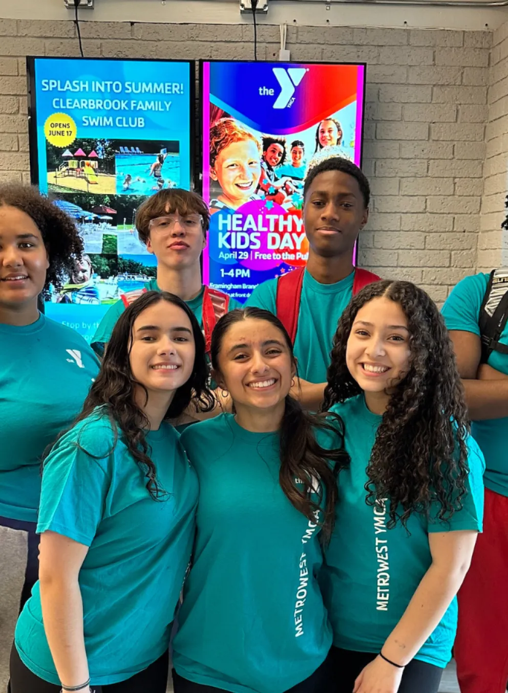 group of teenagers smiling for the camera