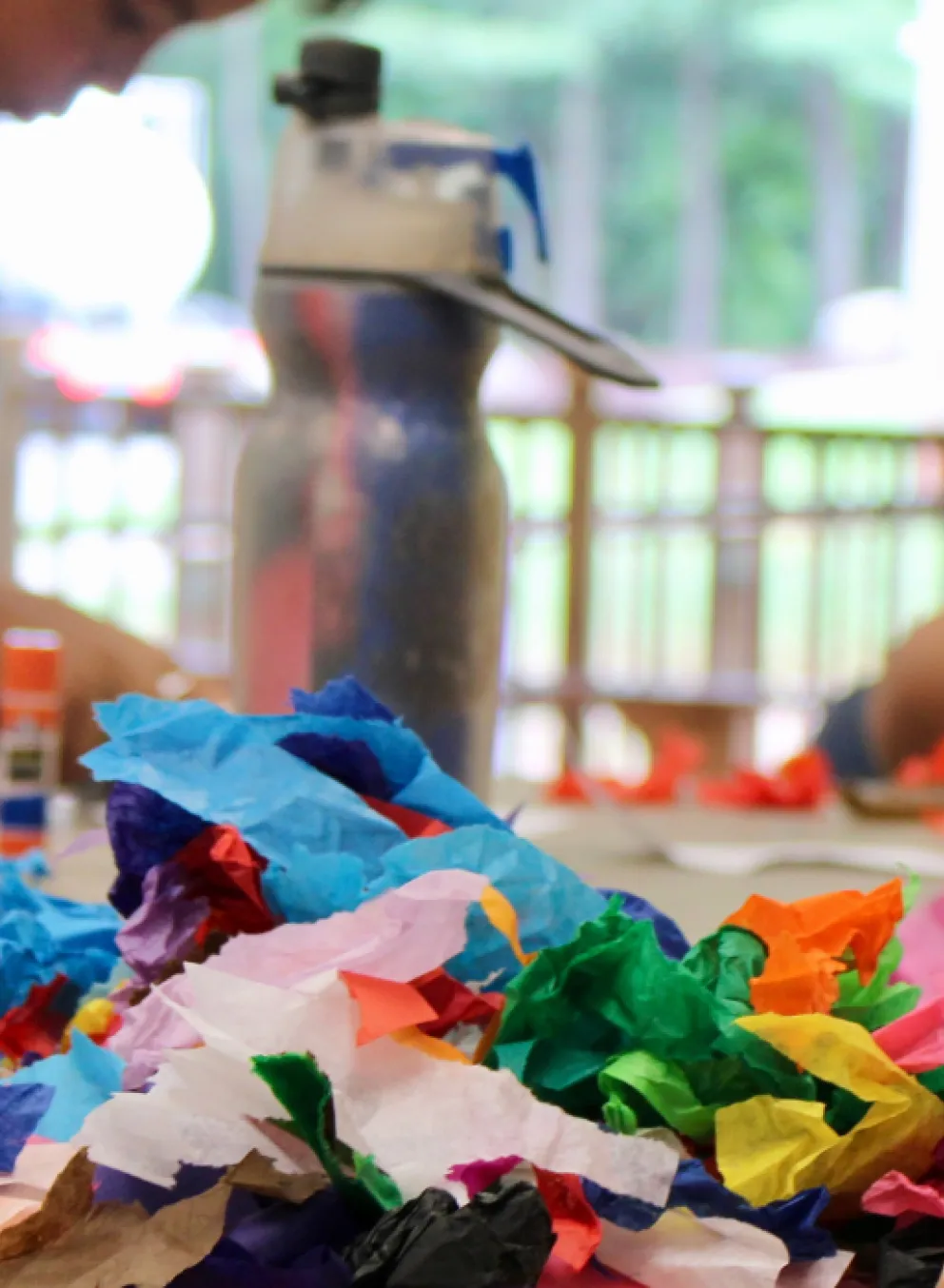 close up image of kids doing arts & crafts