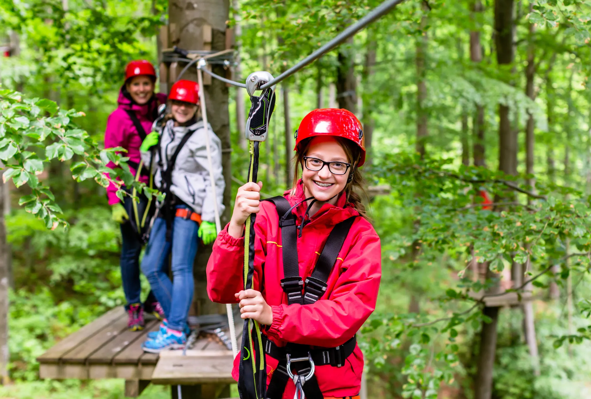 phot of young woman on zipline