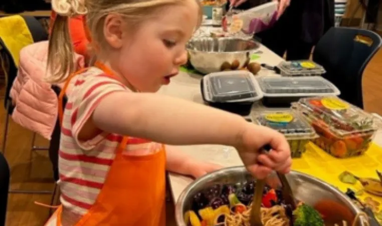 photo of young girl in cooking class