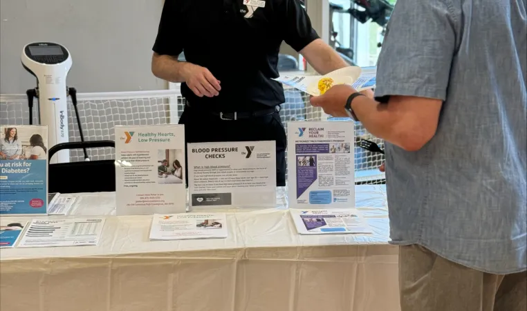 a man learns about programming for seniors at the Y