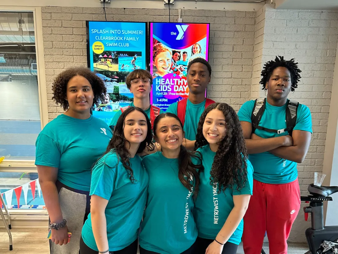 group of teenagers smiling for the camera